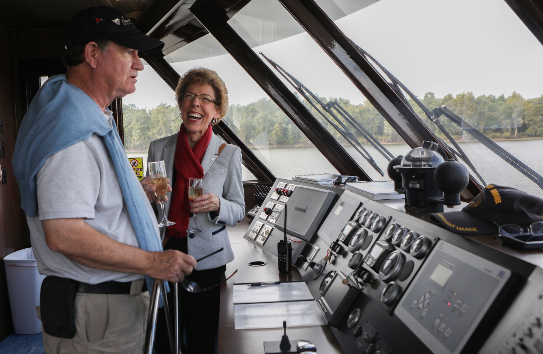 Sandy and Gary Lucy view yacht's controls